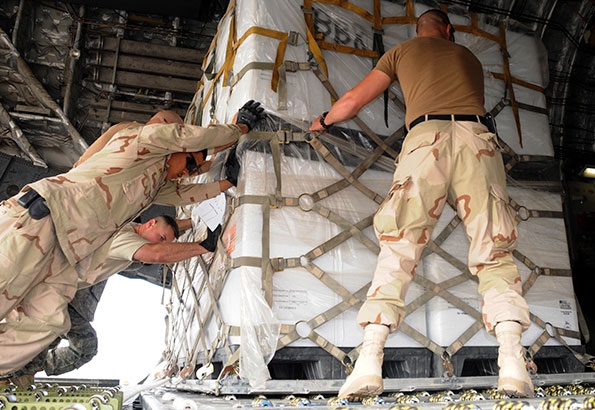 Soldiers loading cargo